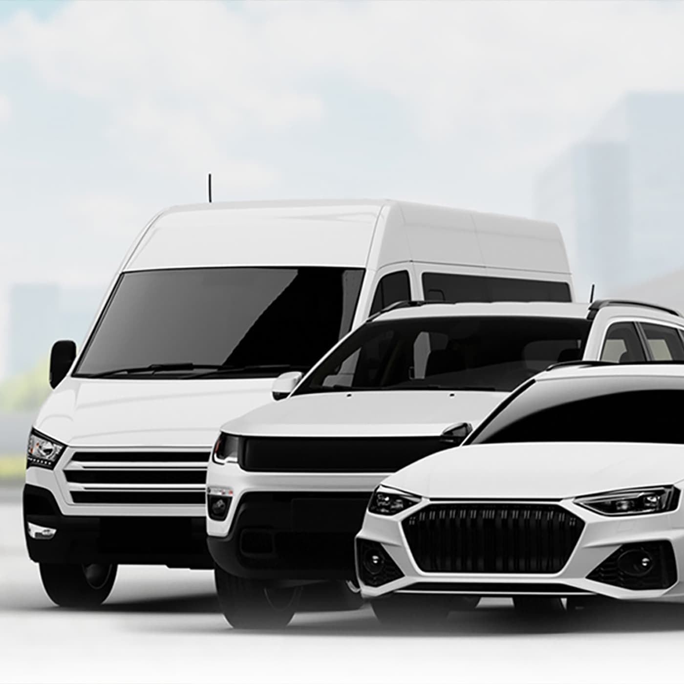 Three fleet vehicles of different sizes against a pale washed out background. Three fleet vehicles of different sizes against a pale washed out background.
