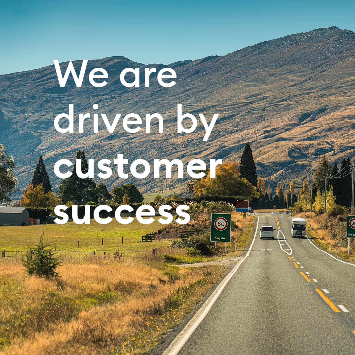 We are driven by customer success. Photo: A road trip of car driving on asphalt road in autumn field and mountain during autumn at South Island of New Zealand. We are driven by customer success. Photo: A road trip of car driving on asphalt road in autumn field and mountain during autumn at South Island of New Zealand.