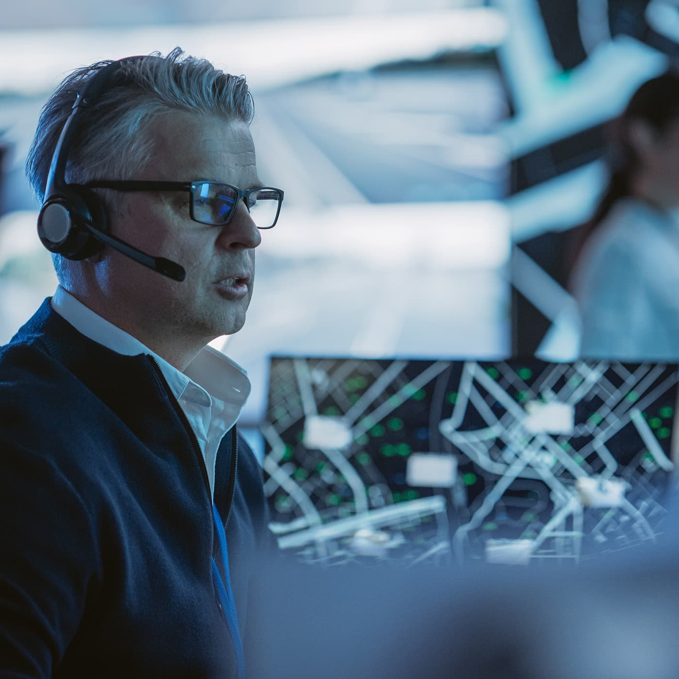 Male fleet manager using digital management tools to support efficient mega fleet operations. Male fleet manager using digital management tools to support efficient mega fleet operations.