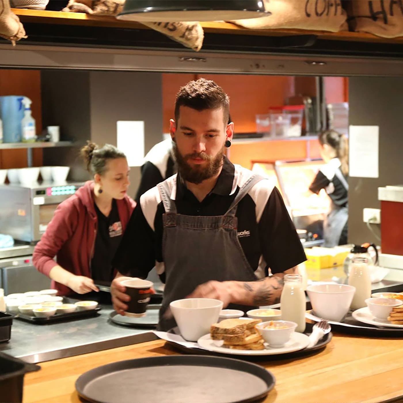 Volunteers at the Magpie Nest Café in Melbourne. Volunteers at the Magpie Nest Café in Melbourne.